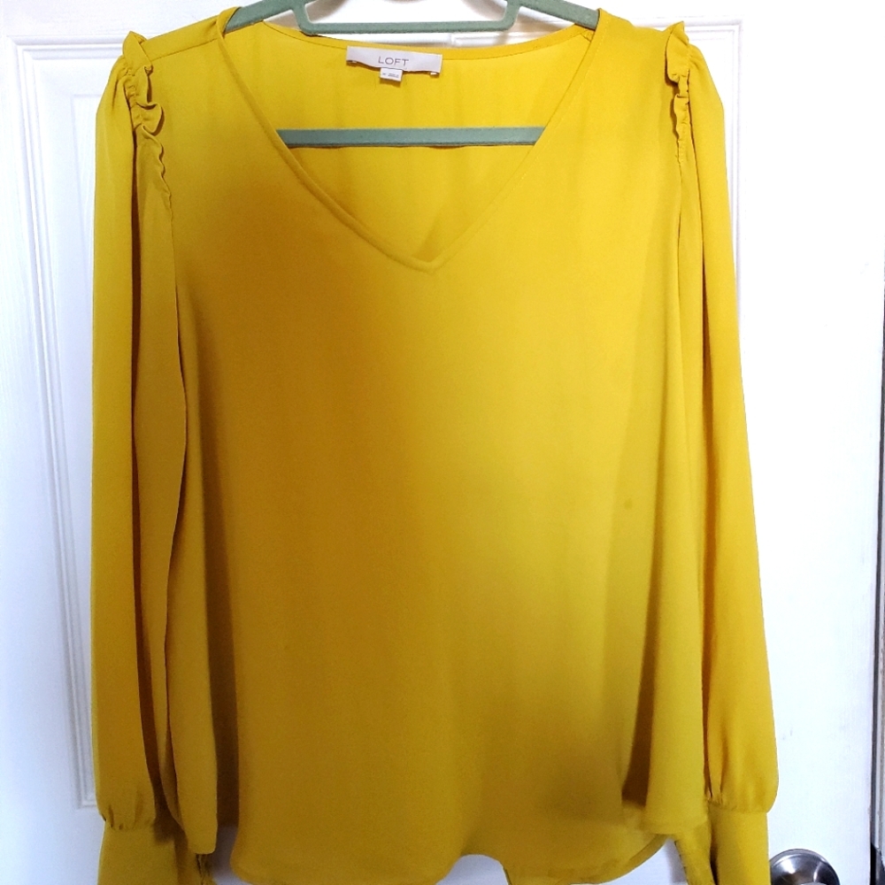 Bright yellow long sleeve v neck top